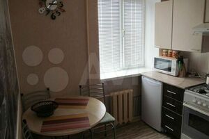 «на Титова 14»