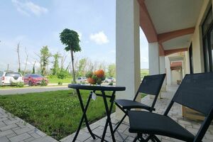 в корпусе «Holiday House» с детской площадкой