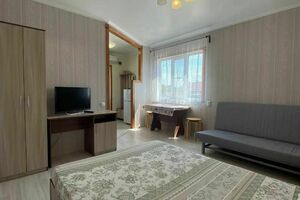 Студия с балконом в частном доме